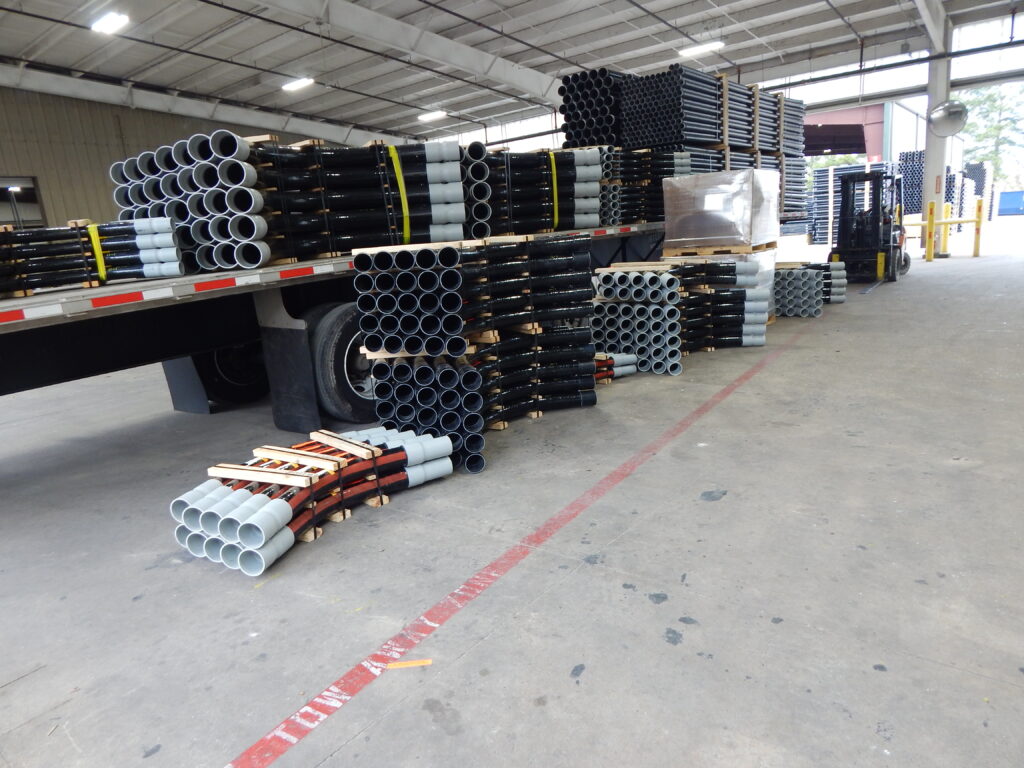 A truckload of fiberglass conduit is ready to ship.