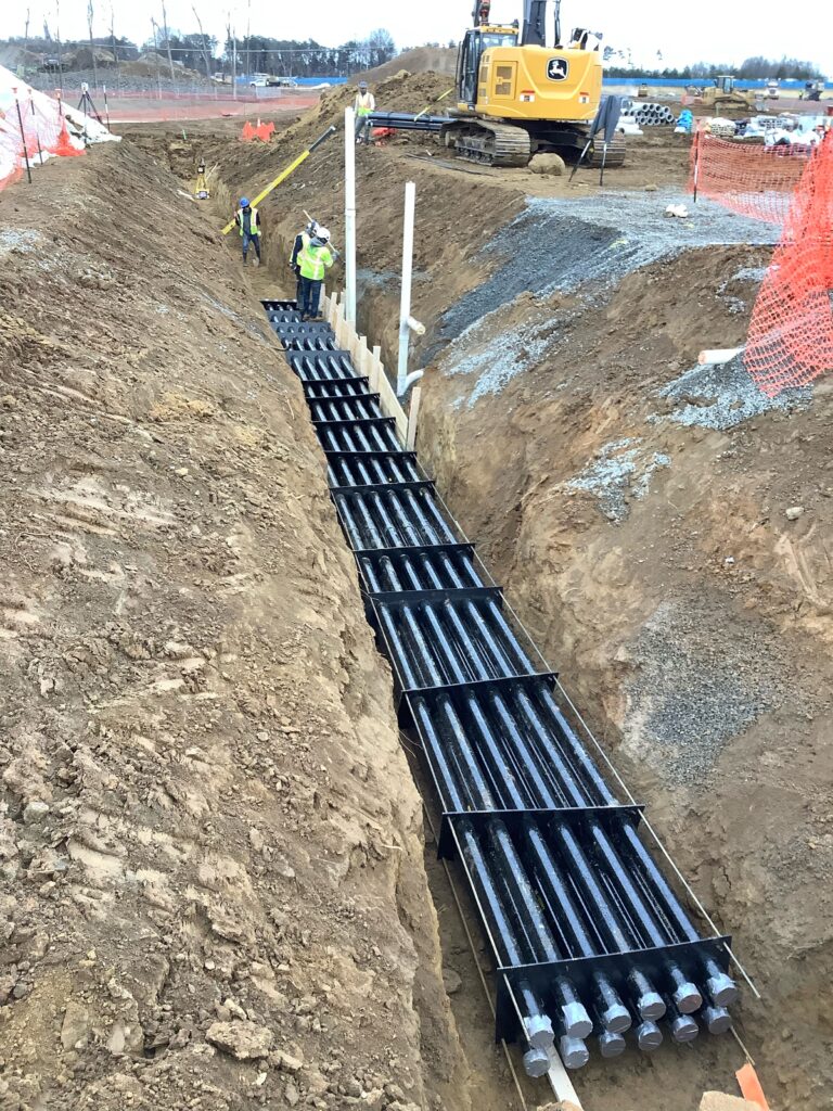 Fiberglass conduit in a buried duct bank